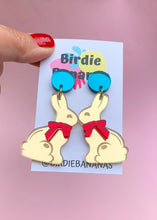 Load image into Gallery viewer, gold easter bunny earrings with red bows
